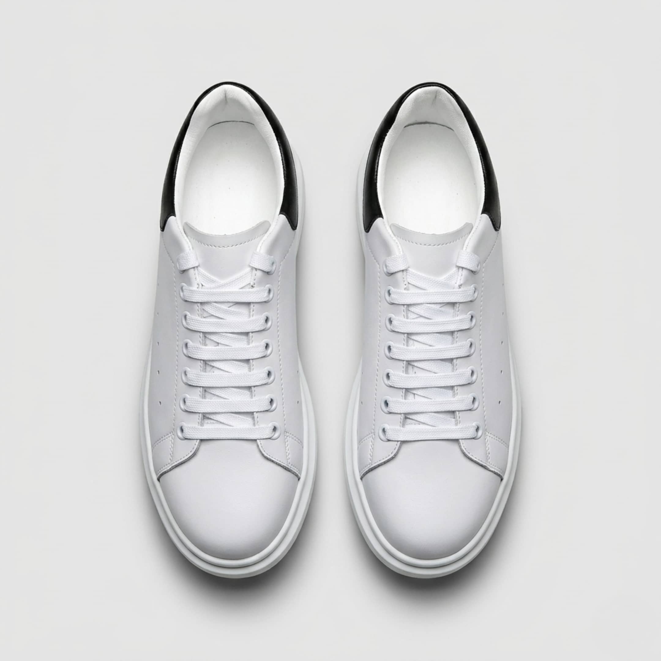FORCIANO AURAS white elevator sneakers with leather upper, top view of the pair.