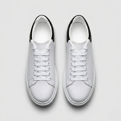 FORCIANO AURAS white elevator sneakers with leather upper, top view of the pair.