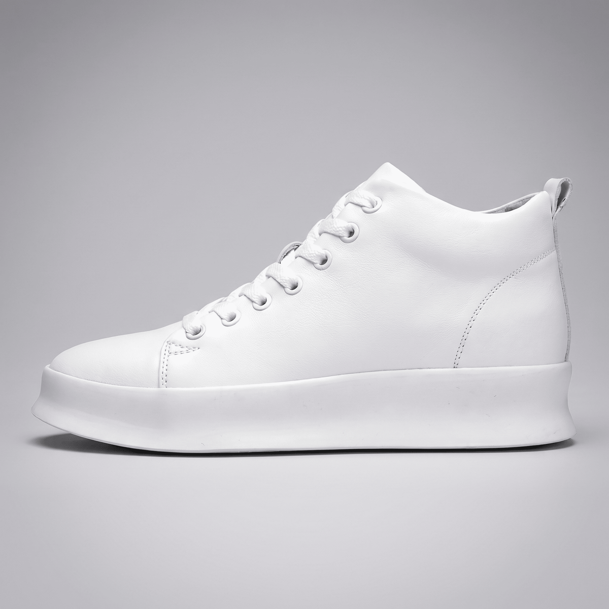 White FORCIANO ACHILLES Height Boosting Sneakers shown from a clean side-profile view.