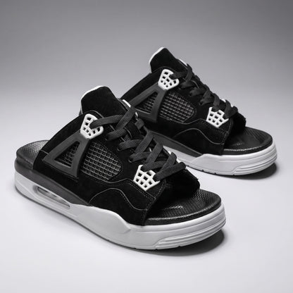 Pair of black FORCIANO AERO Height Increasing Slippers shown from a front three-quarter angle with white sole accents.
