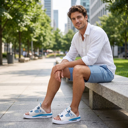 Man wearing white blue FORCIANO AERO Height Increasing Slippers in lifestyle views.