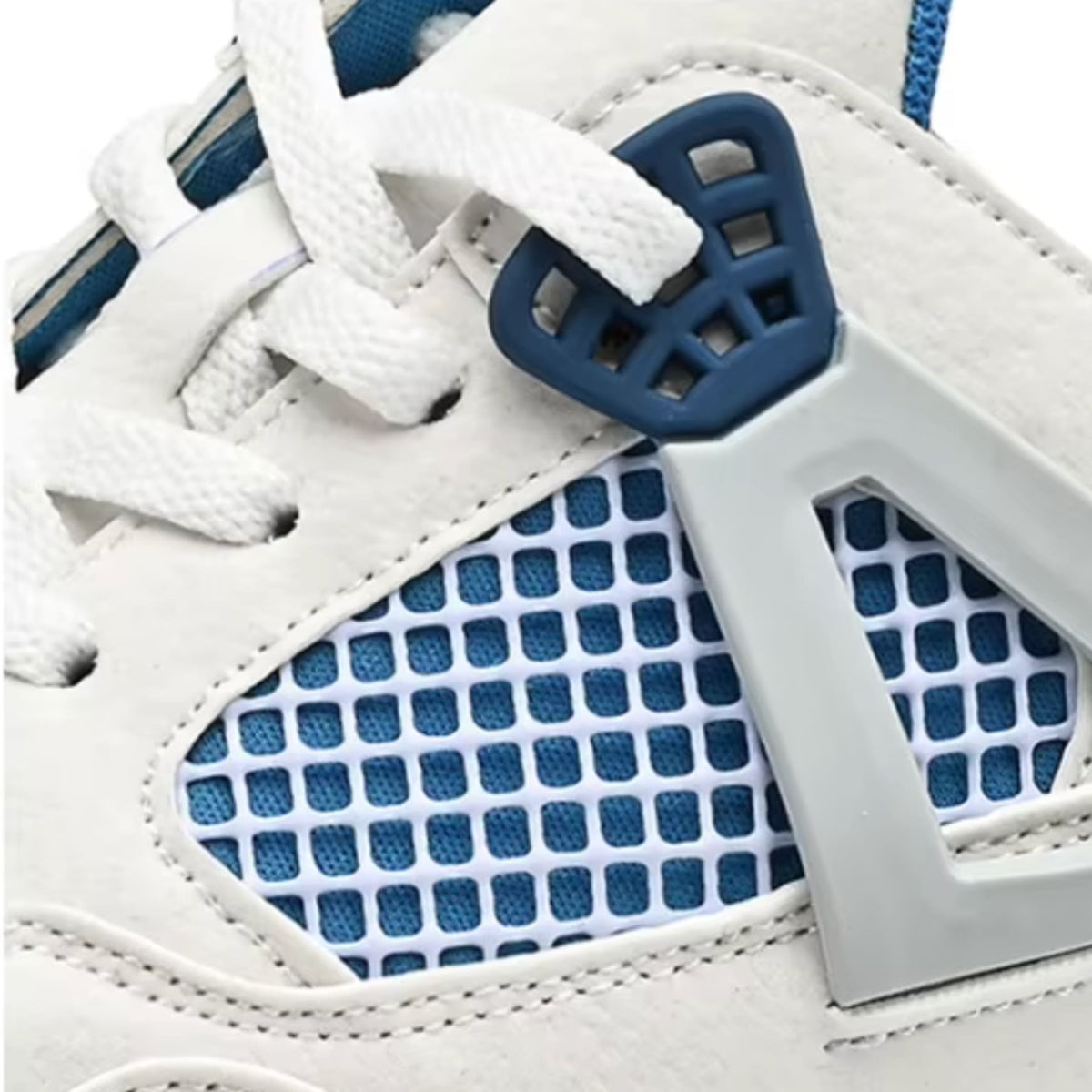Close-up of white and blue FORCIANO AERO Height Increasing Slippers showing the laces, mesh panel, and side support detail.