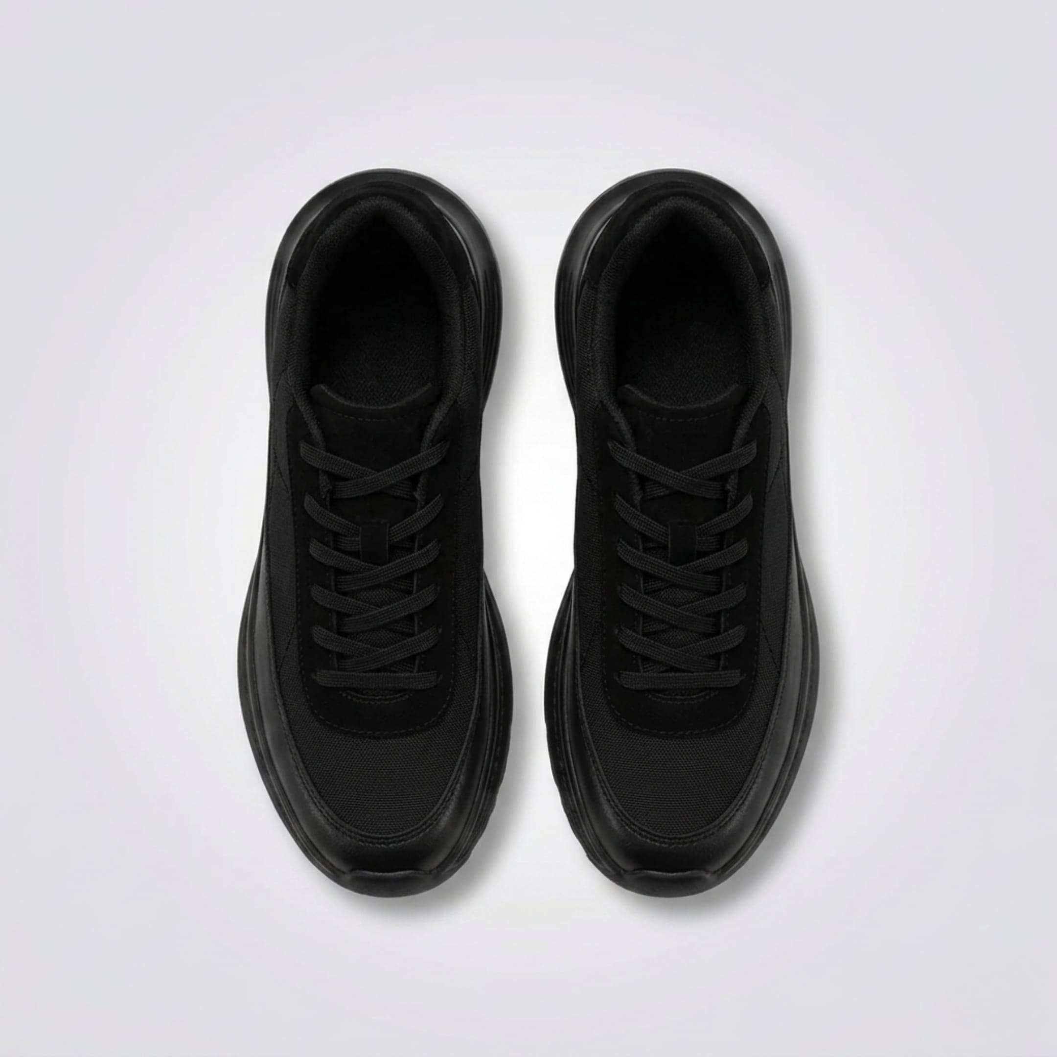 FORCIANO AEROX black height increasing sneakers with premium leather upper displayed as a pair from a top view with black laces visible.