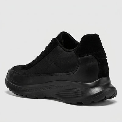 FORCIANO AEROX black height increasing sneakers with premium leather upper shown from a rear three-quarter side angle, highlighting the heel and sole profile.