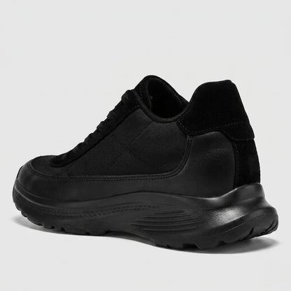 FORCIANO AEROX black height increasing sneakers with premium leather upper shown from a rear three-quarter side angle, highlighting the heel and sole profile.