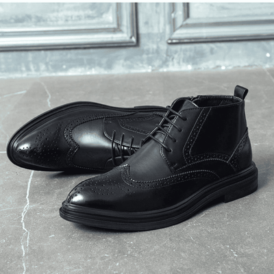 FORCIANO ALTIER black leather elevator boots displayed as a pair with one boot in side view and one at a front three-quarter angle.