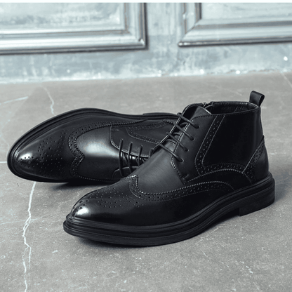 FORCIANO ALTIER black leather elevator boots displayed as a pair with one boot in side view and one at a front three-quarter angle.
