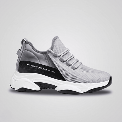 FORCIANO ALTITUDE gray height increasing sneaker shown from the side with the internal lift area visible