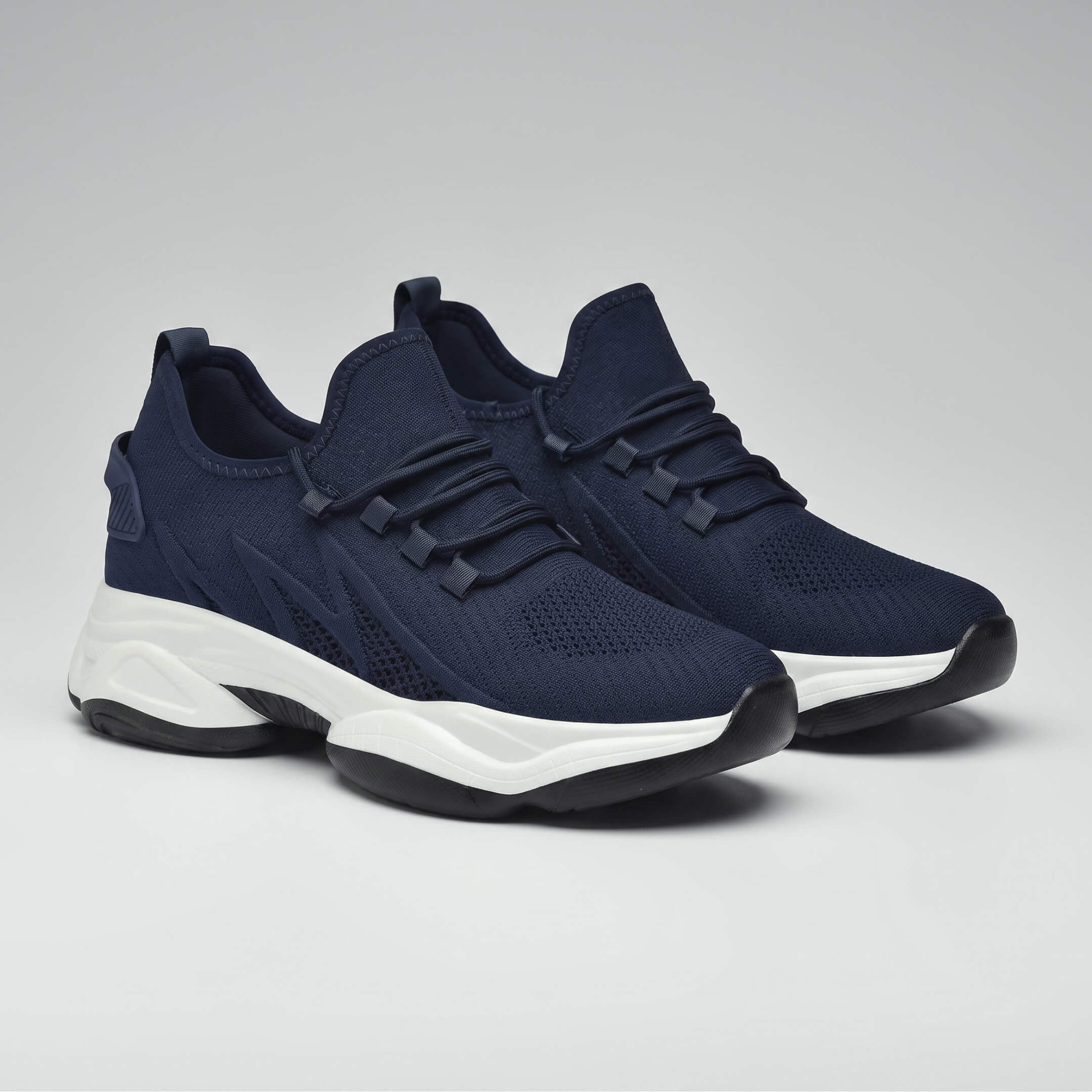 Pair of FORCIANO ALTITUDE blue breathable mesh sneakers shown in angled product view with supportive elevated sole.