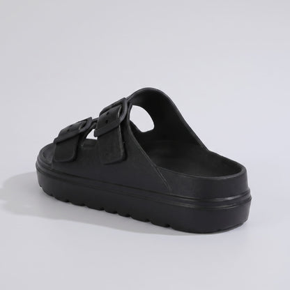FORCIANO ARCHER black EVA sandal shown from a rear three-quarter angle, displaying the footbed, buckle straps and raised sole of the Height Increasing Shoes.