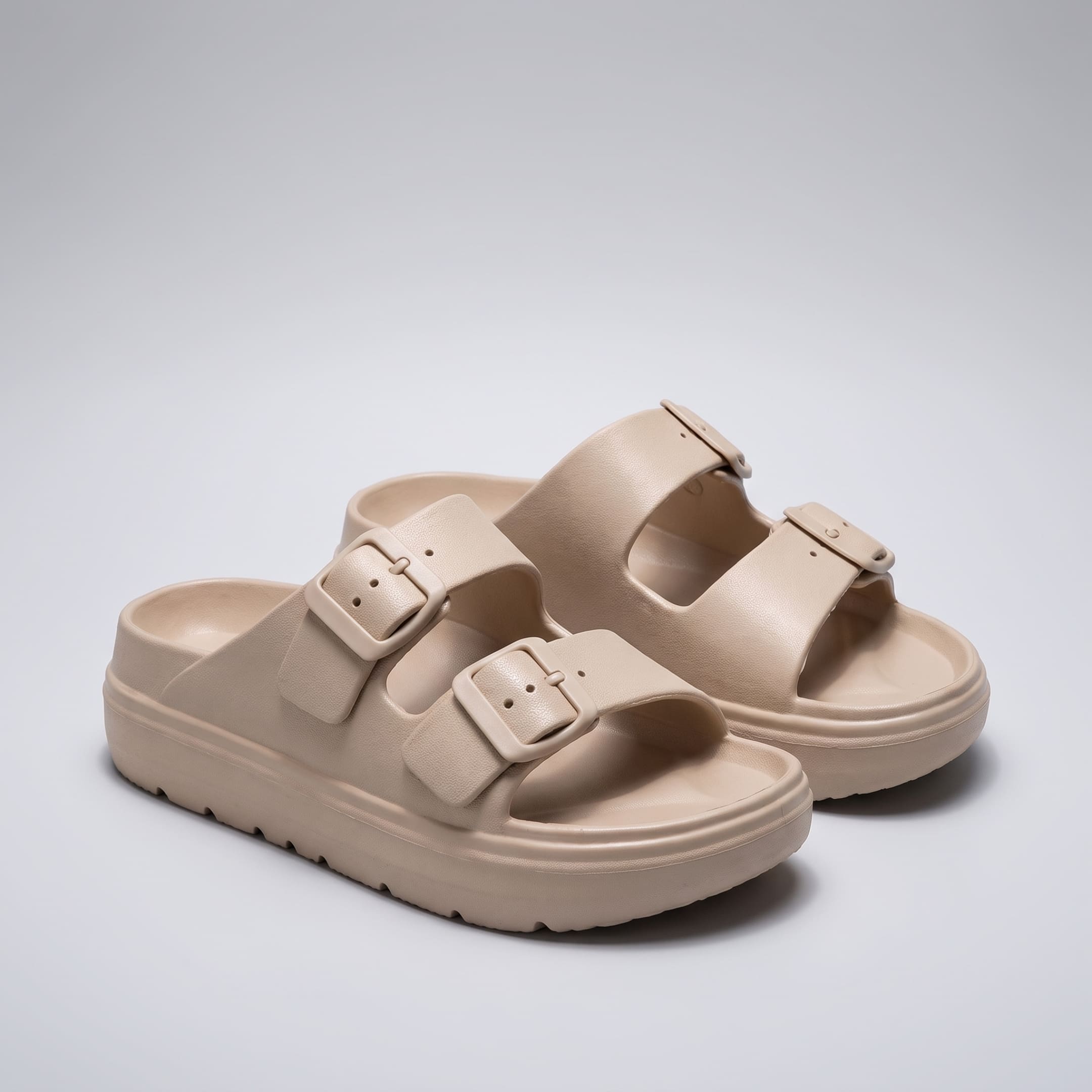 Pair of FORCIANO ARCHER khaki EVA sandals shown from a front three-quarter angle, featuring two buckle straps and the Height Increasing Shoes sole design.