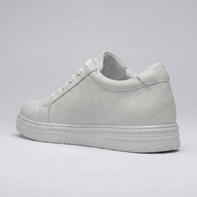 FORCIANO ATHENA white women's elevator sneaker shown from the rear three-quarter angle, featuring a premium leather upper, heel stitching and white sole.