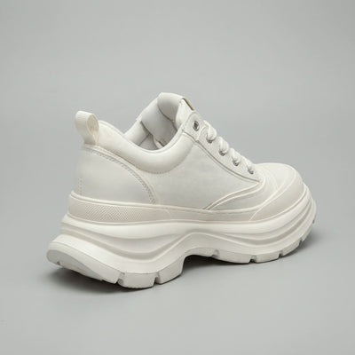 FORCIANO ATLAS Beige White elevator sneaker shown from a rear three-quarter angle with its canvas and leather upper and sculpted sole visible.