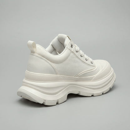 FORCIANO ATLAS Beige White elevator sneaker shown from a rear three-quarter angle with its canvas and leather upper and sculpted sole visible.