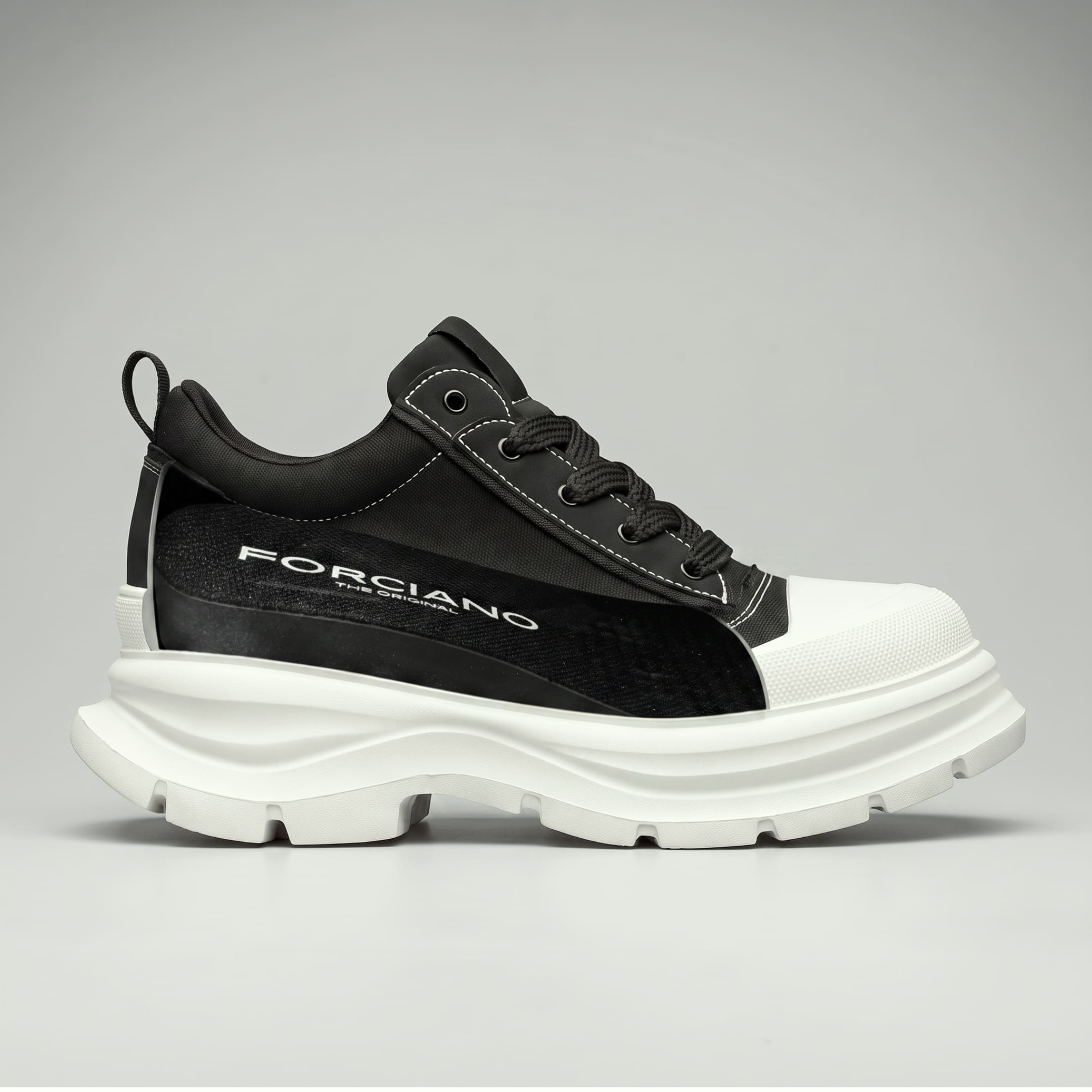FORCIANO ATLAS Black elevator sneaker shown from the side with the internal lift section exposed above the White chunky sole.