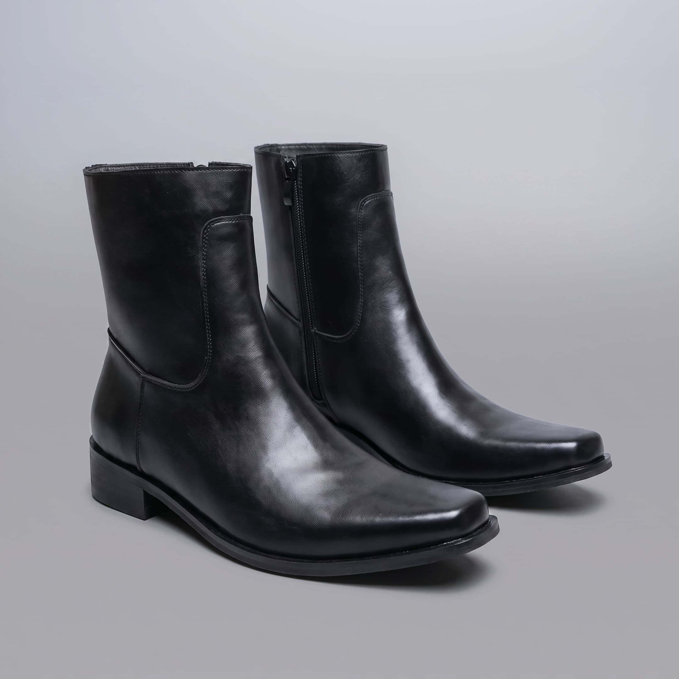 FORCIANO AURESTO black height increasing boots with smooth microfiber upper displayed as a pair from a front three-quarter view.