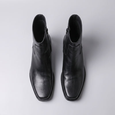 FORCIANO AURESTO black height increasing boots with smooth microfiber upper shown as a pair in top view with ankle openings visible.