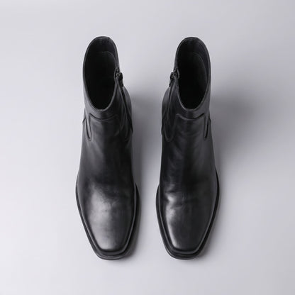 FORCIANO AURESTO black height increasing boots with smooth microfiber upper shown as a pair in top view with ankle openings visible.