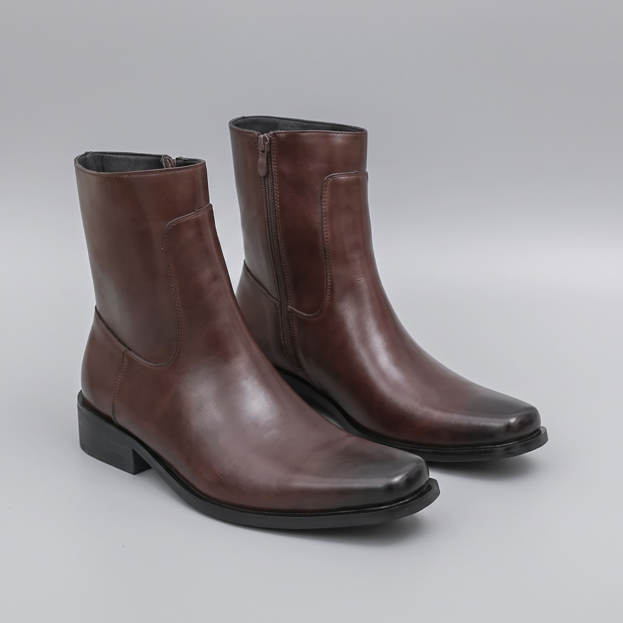 FORCIANO AURESTO brown height increasing boots with smooth microfiber upper shown as a pair from a front three-quarter angle.