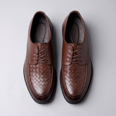 FORCIANO AUTHORITY Height Increasing Shoes in Brown premium leather, shown as a pair from the top with laces and woven front panels visible.