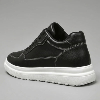 FORCIANO AVERY black height increasing sneaker for women in rear three-quarter view, showing the premium leather upper and white raised sole.