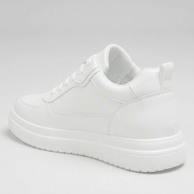 FORCIANO AVERY white height increasing sneaker for women shown from the rear three-quarter angle with premium leather upper and layered white sole.