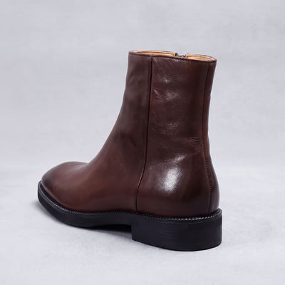 FORCIANO BELLANO brown Elevator Boots in genuine leather shown as a single boot from a rear three-quarter angle.