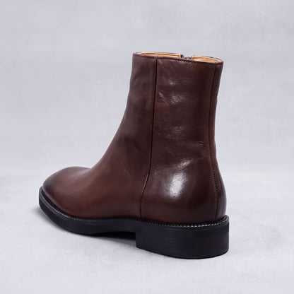 FORCIANO BELLANO brown Elevator Boots in genuine leather shown as a single boot from a rear three-quarter angle.