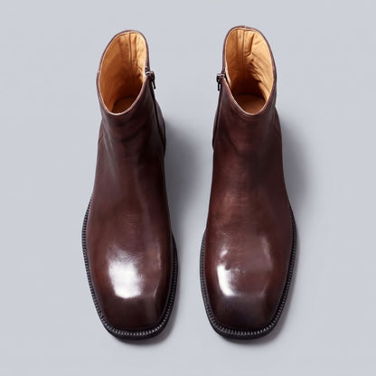 FORCIANO BELLANO brown Elevator Boots in genuine leather shown as a pair from a top-front view with the interior openings visible.