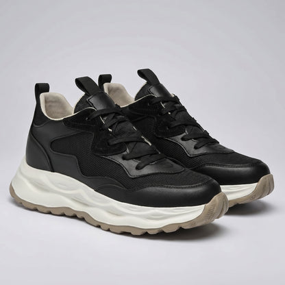FORCIANO BELLUNO black elevator-style sneakers with premium leather upper, displayed as a pair from the front three-quarter angle.