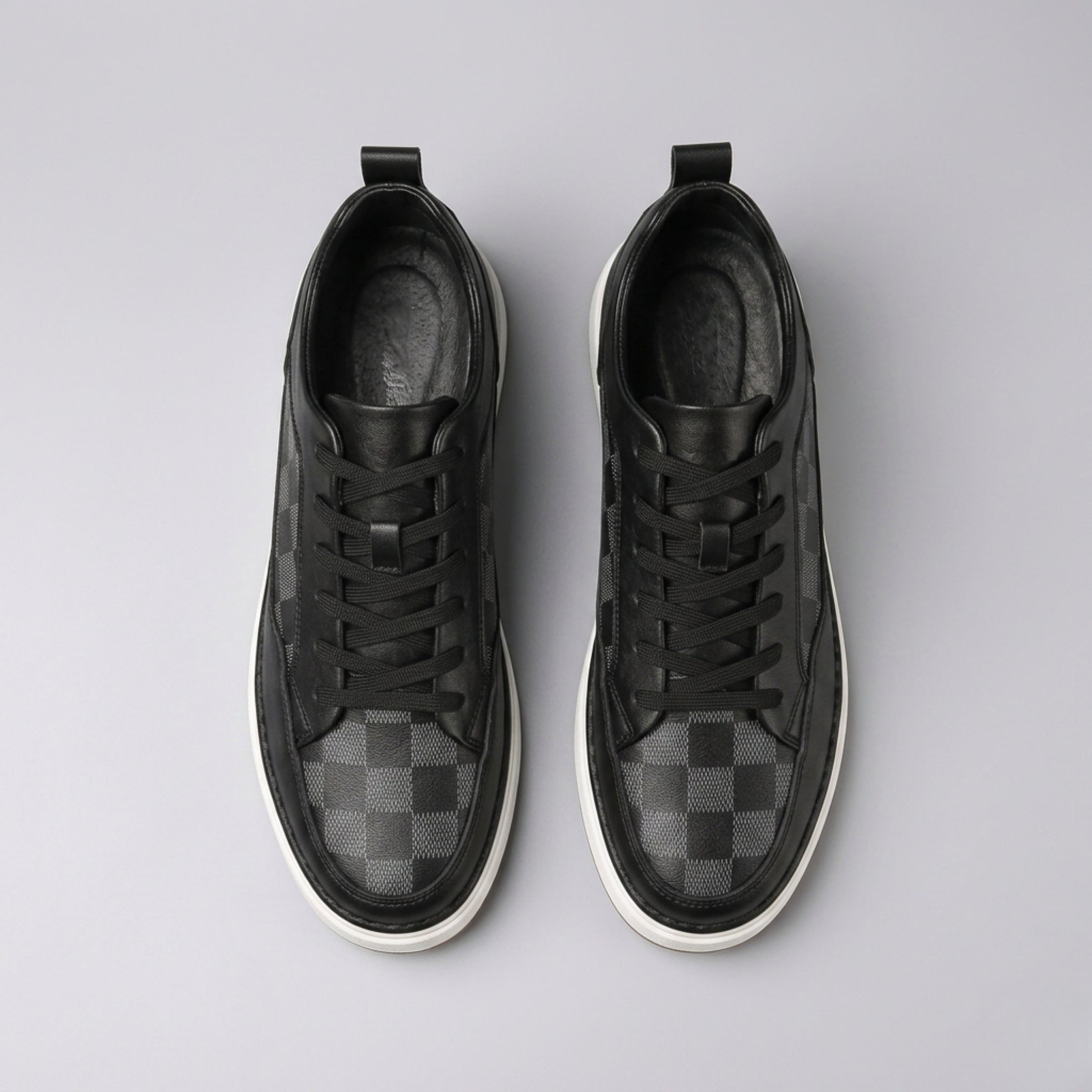 FORCIANO BELMONTE black leather Height Increasing Sneakers shown as a pair from the top view with black laces and dark checkered toe panels.