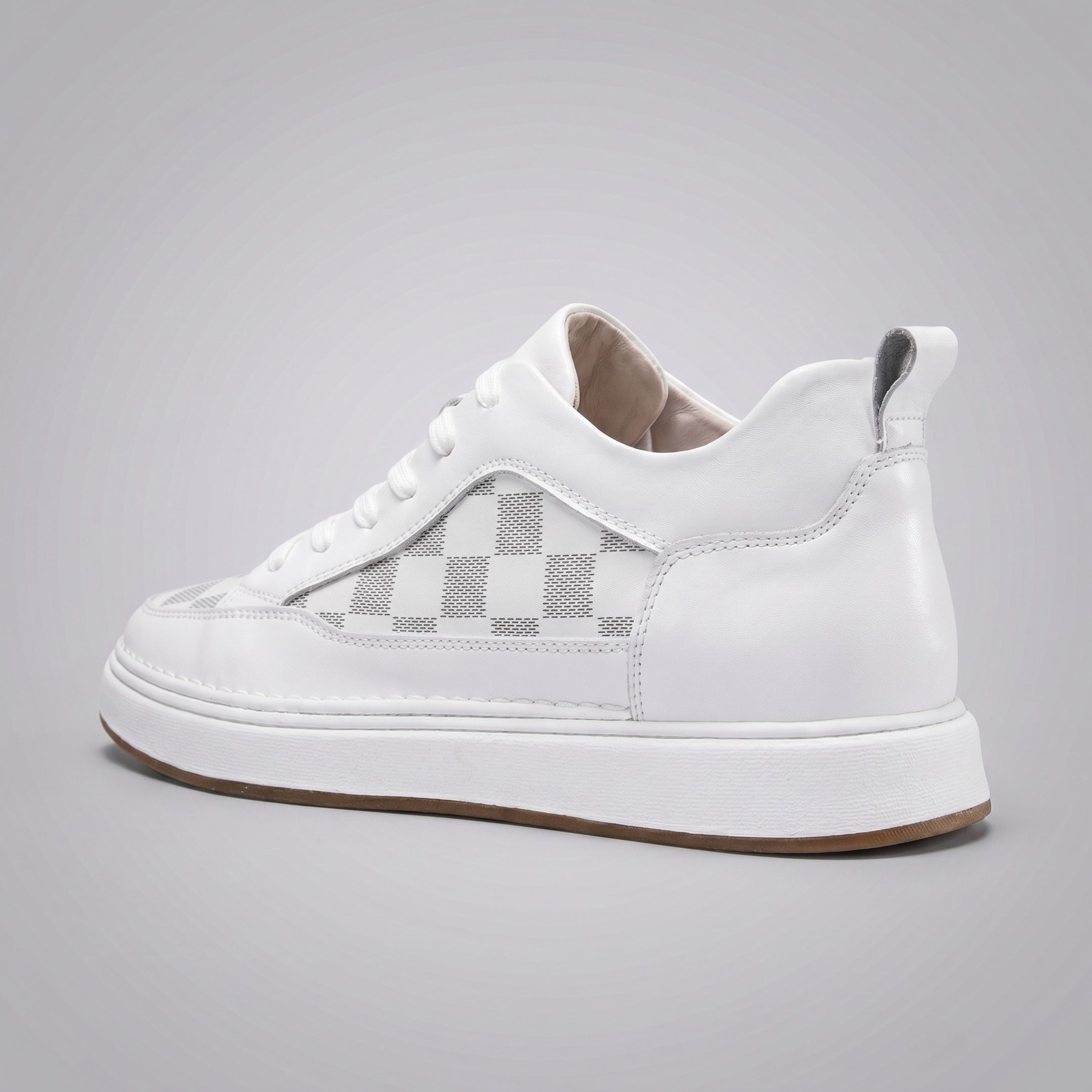 FORCIANO BELMONTE white leather Height Increasing Sneakers with a gray checkered side panel, shown from a rear three-quarter angle with the heel pull tab and white sole visible.