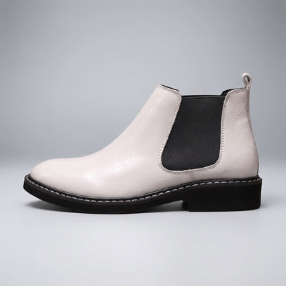 FORCIANO BRIXTON white women's elevator boot in full side profile with premium leather upper, black elastic side panel and black sole.