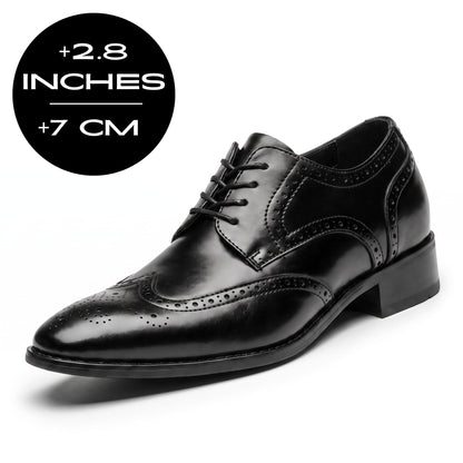 FORCIANO BROGUE black premium leather elevator dress shoe in front three-quarter view with visible 7 cm / 2.8" height increase graphic.