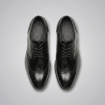 FORCIANO BROGUE black premium leather elevator dress shoes shown from above as a pair with lace-up fronts and brogue perforations.