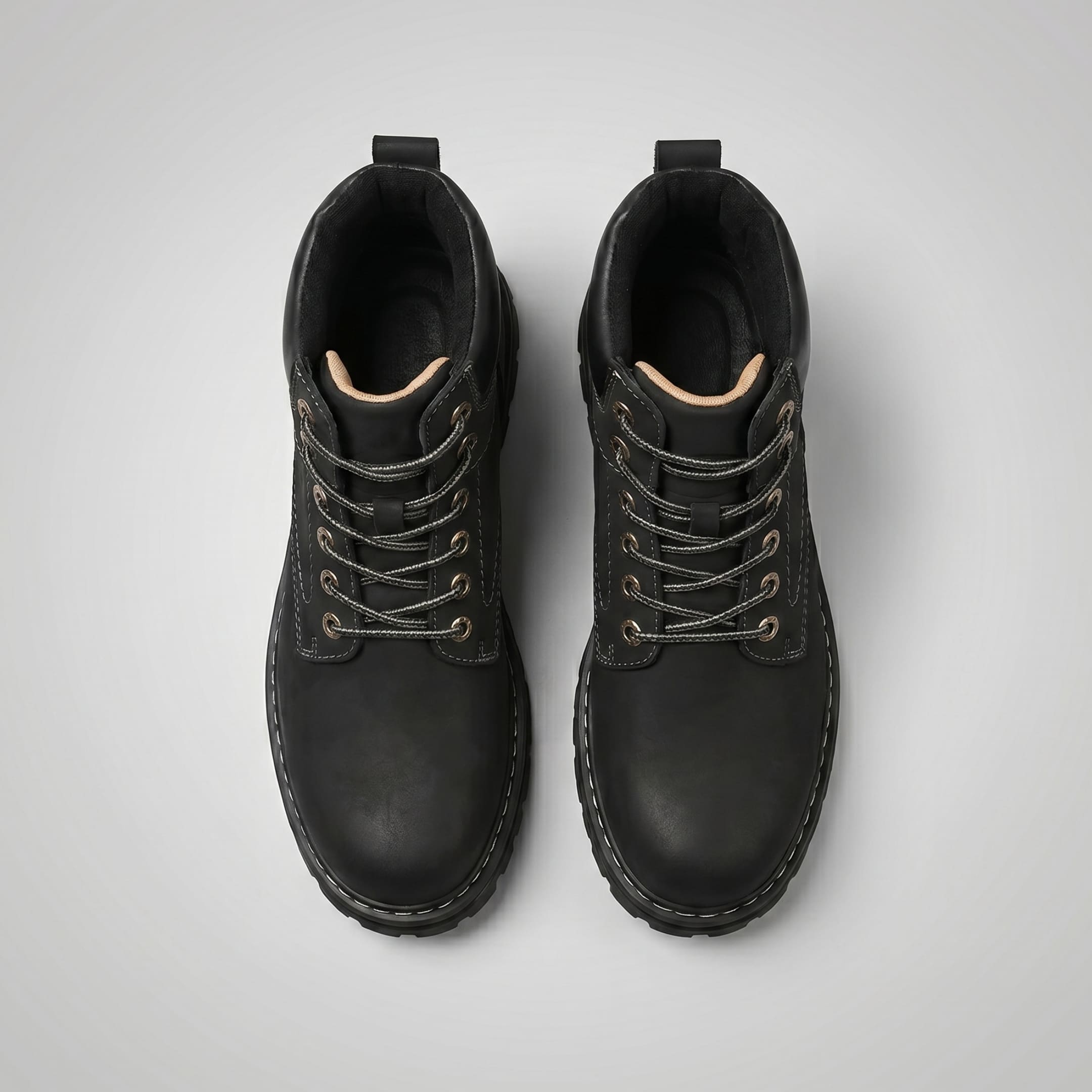 FORCIANO CALIBER black elevator boots with premium suede uppers shown as a pair from the top, highlighting the laces, collars and toe shape.