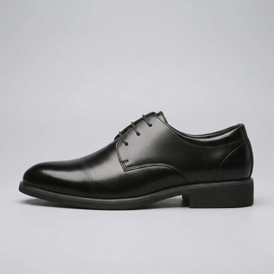 Side profile of a FORCIANO CAVELLO black elevator dress shoe with premium leather upper, lace-up front and polished Oxford finish.