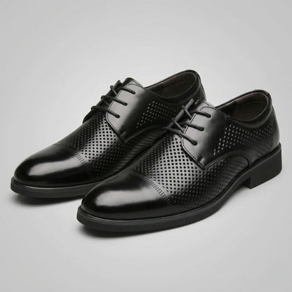 Pair of FORCIANO CAVELLO black perforated elevator dress shoes with premium leather uppers displayed from a front three-quarter angle.
