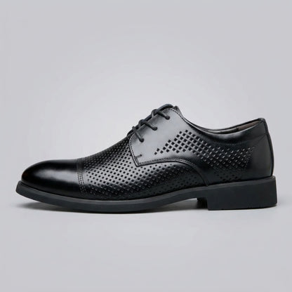 Side profile of a FORCIANO CAVELLO black perforated elevator dress shoe with premium leather upper and patterned perforated panels.