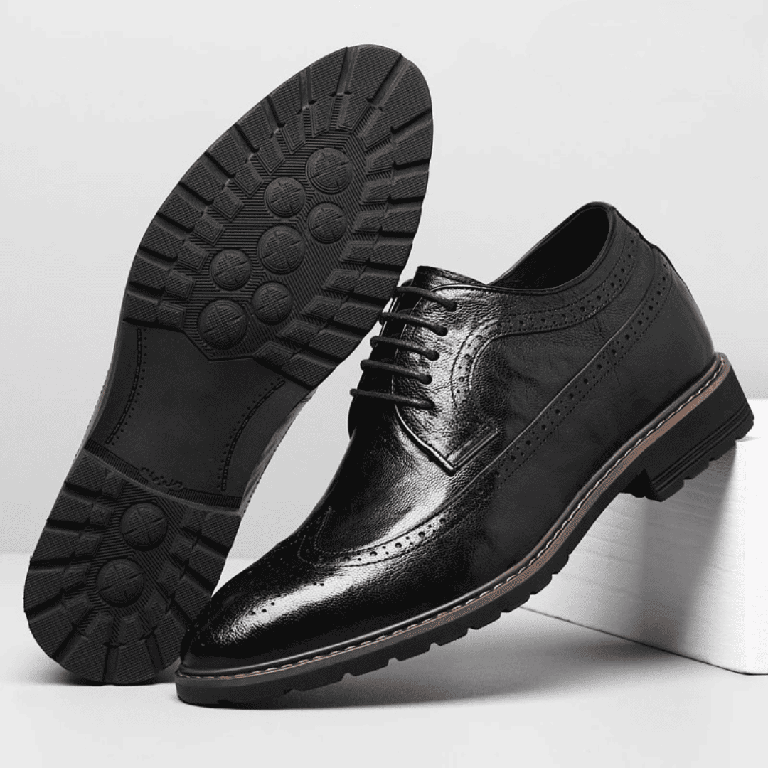 FORCIANO CELSUS black elevator dress shoe beside a full outsole view, showing the tread pattern and premium leather upper.