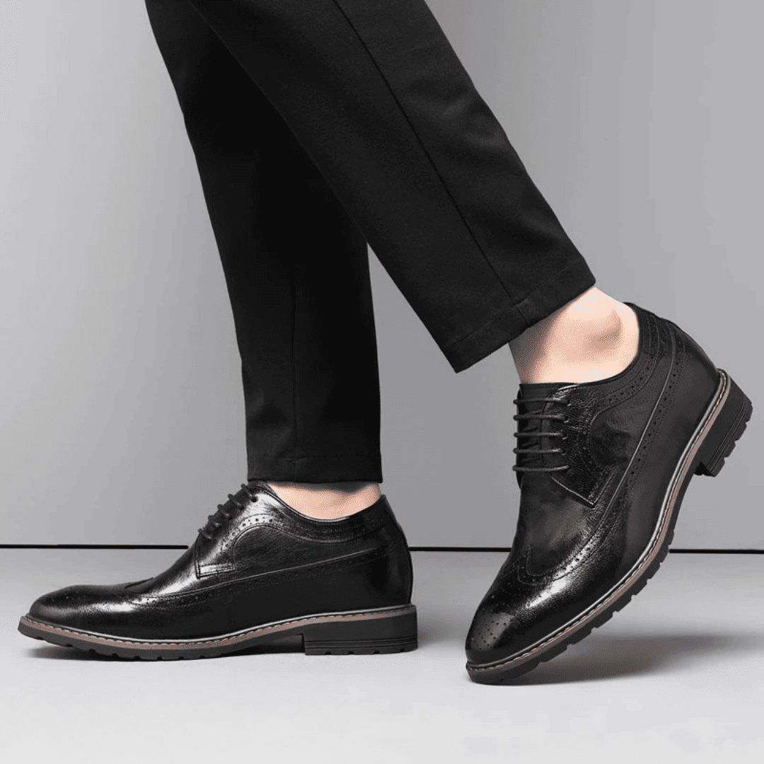 FORCIANO CELSUS black elevator dress shoes worn with black trousers in a side lifestyle view, showing the premium leather uppers and lace-up design.