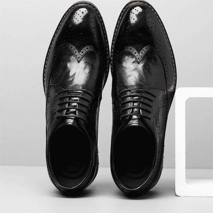 FORCIANO CELSUS black premium leather elevator dress shoes shown as a pair from above with wingtip-style perforated detailing and laces.