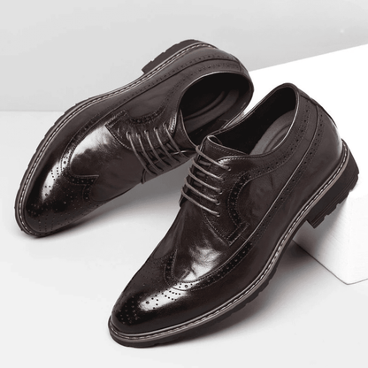 FORCIANO CELSUS brown elevator dress shoes with premium leather uppers displayed as an angled pair, highlighting the lace-up and brogue details.