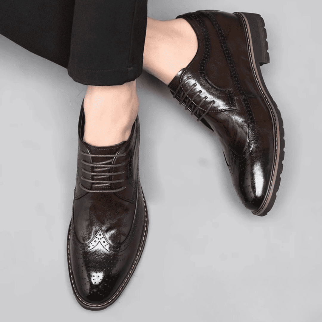 FORCIANO CELSUS brown elevator dress shoes worn from a top angle, showing the premium leather uppers, laces and brogue detailing.