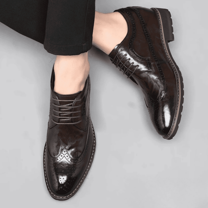 FORCIANO CELSUS brown elevator dress shoes worn from a top angle, showing the premium leather uppers, laces and brogue detailing.