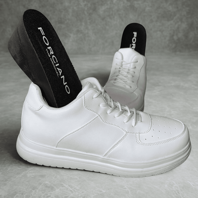 FORCIANO CHAMPION white Elevator Sneakers shown as a pair with black FORCIANO lift inserts visibly positioned inside the shoes.