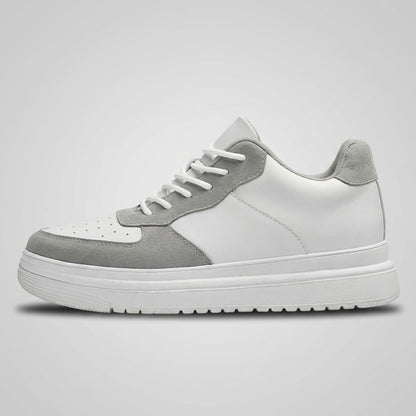 FORCIANO CHAMPION white and gray sneaker shown in a clean side profile with lace-up front, perforated toe panel, and raised sole.