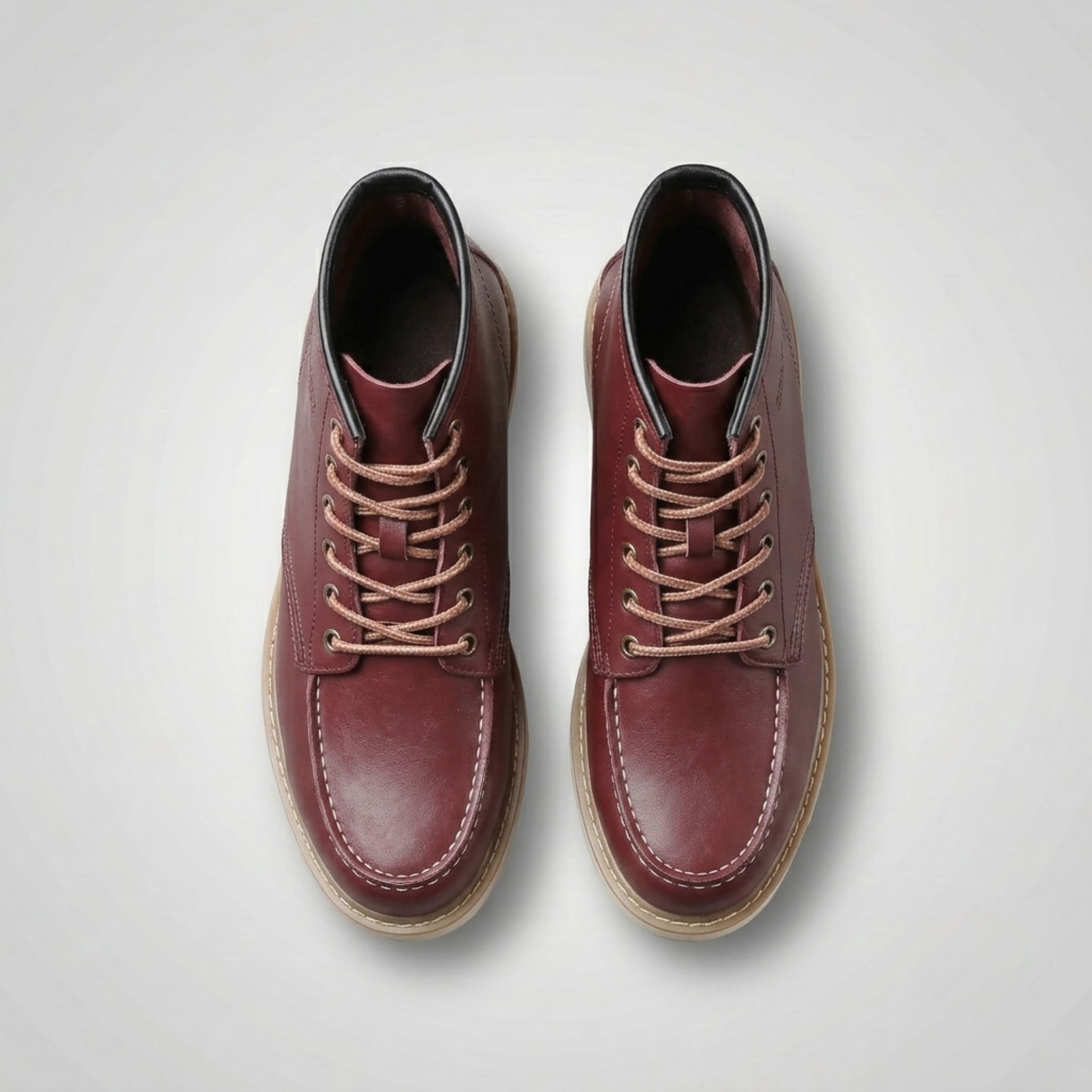 FORCIANO CONQUER red height increasing boots shown as a pair from the top view with tan laces, metal eyelets, moc-toe stitching, and visible outsole edges.