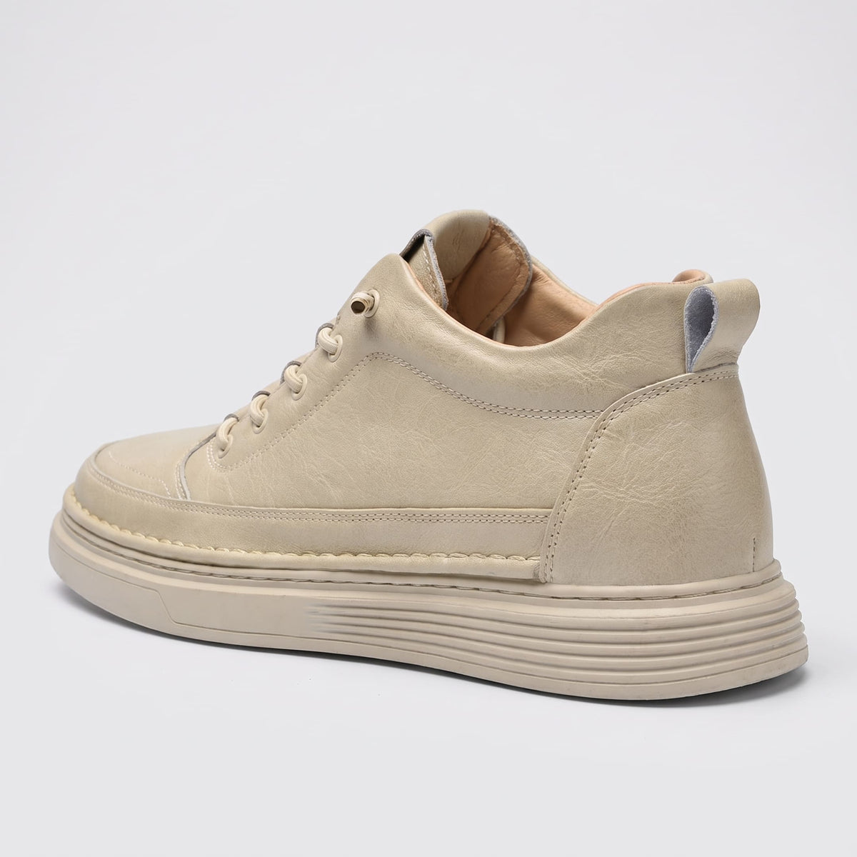 FORCIANO COURAGE Beige Height-Increasing Shoes shown from a rear three-quarter angle with premium leather upper, stitched heel section and light sole.
