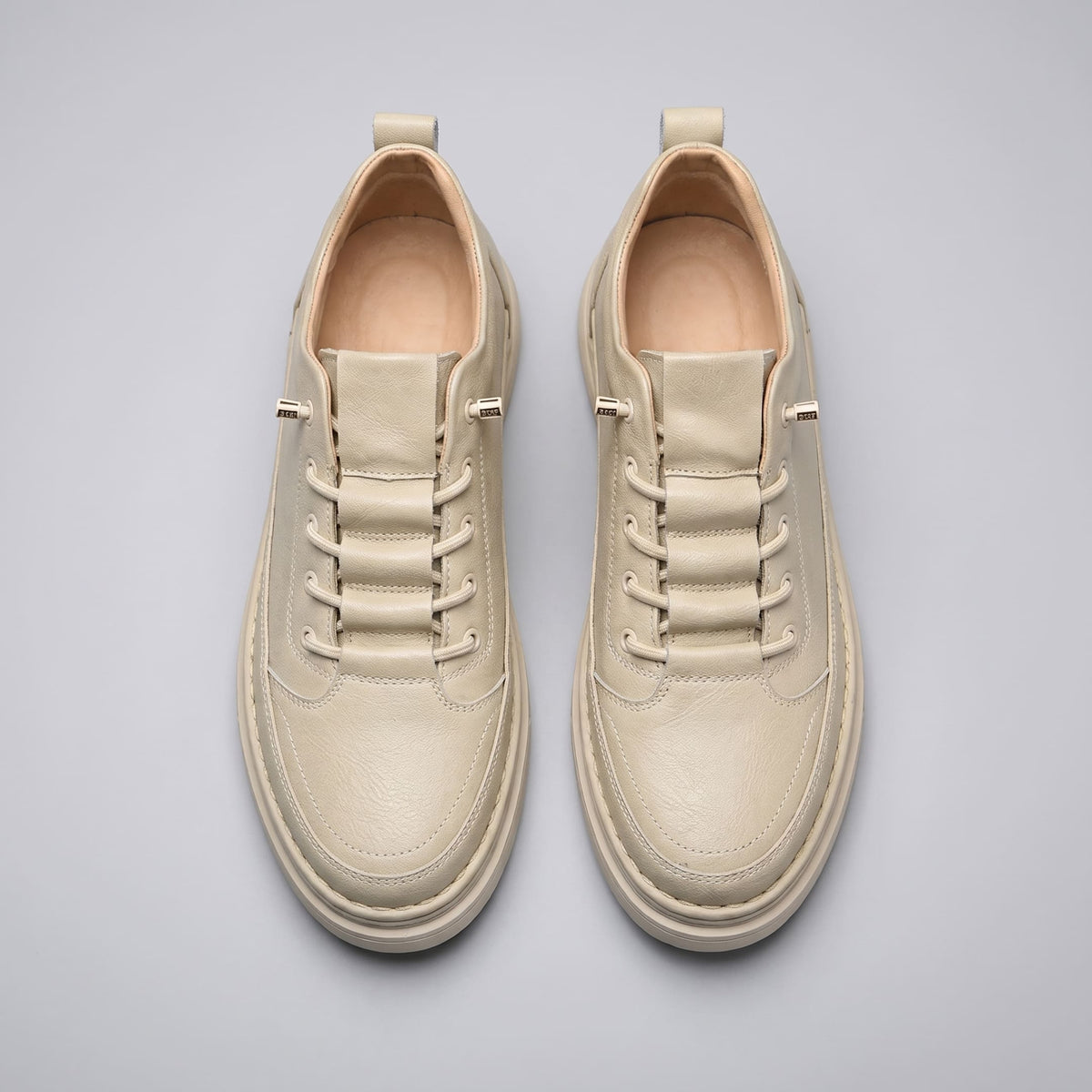 FORCIANO COURAGE beige Height-Increasing Shoes shown as a top-view pair with premium leather uppers, lace detailing and matching light soles.